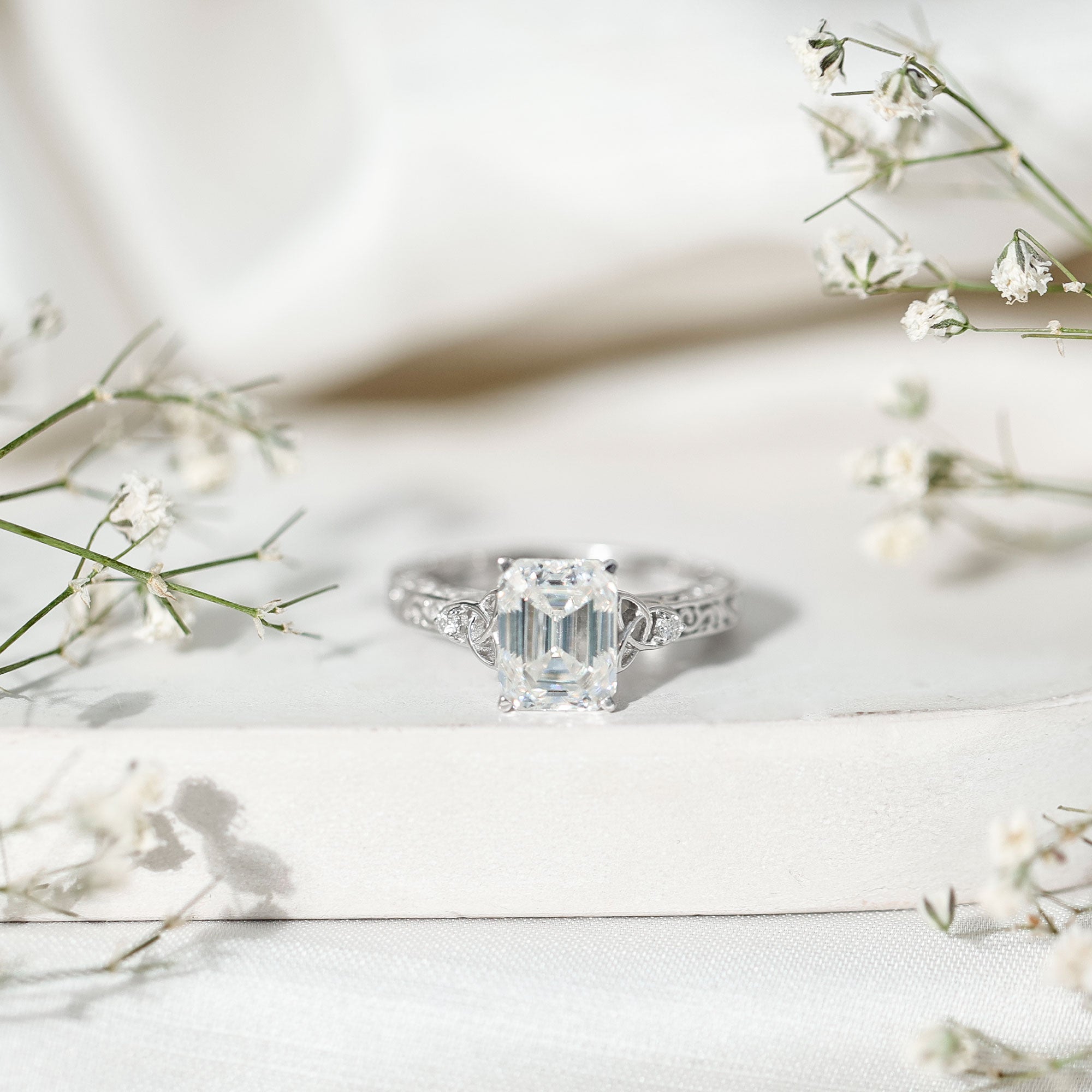 7X9 mm Emerald Cut Moissanite Solitaire Celtic Ring with Engraved Shank